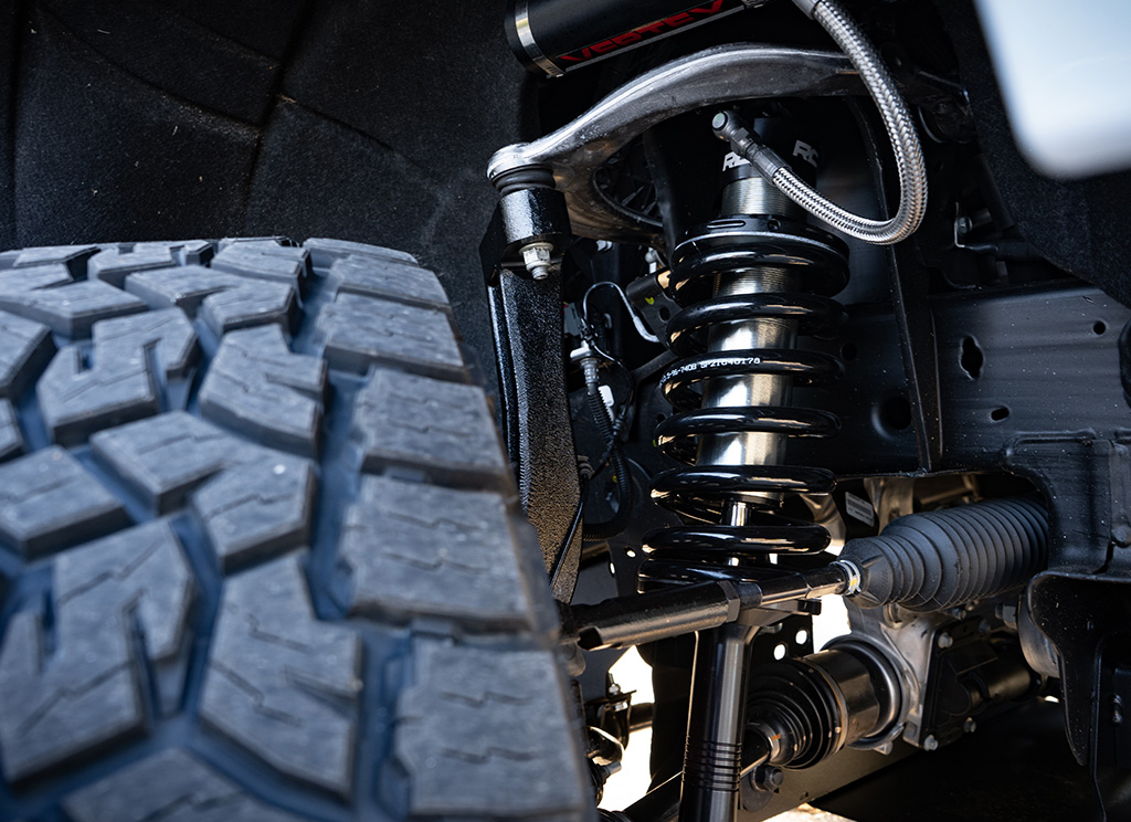 Close-up of Vertex shocks on the newly installed lift kit.