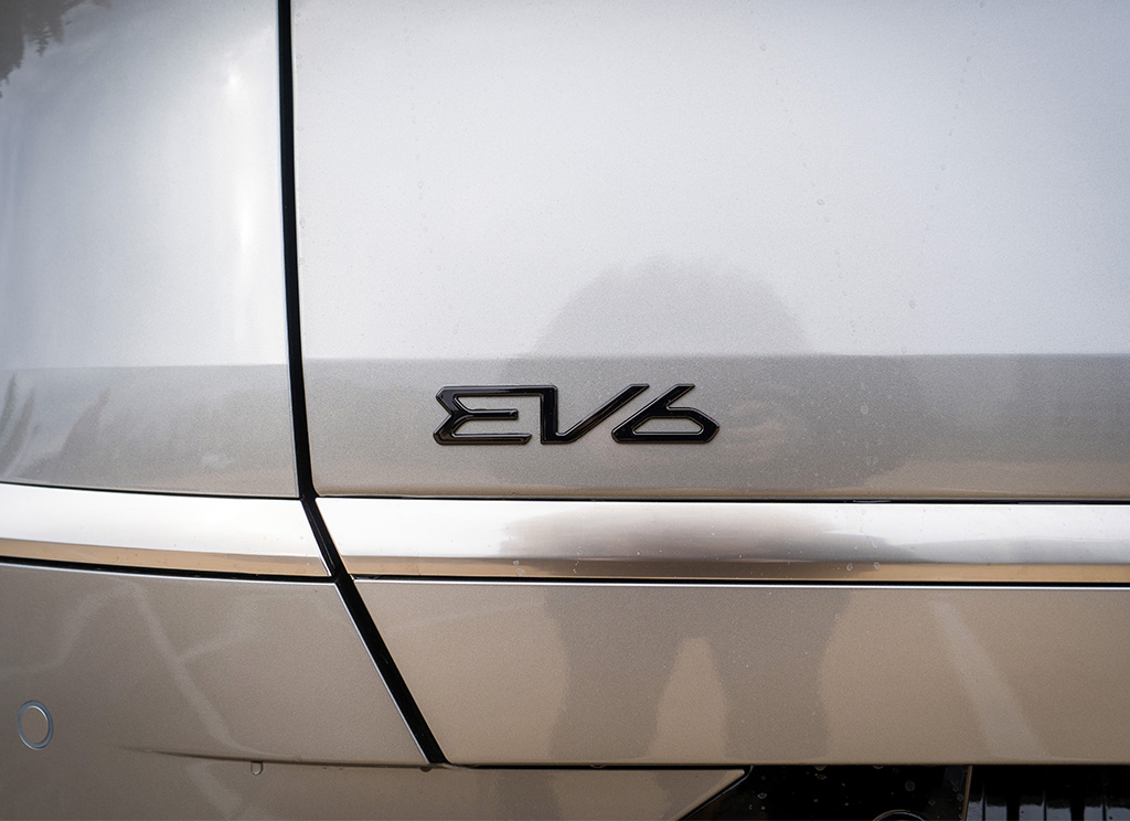 Metallic Gray Kia EV6 with blackout EV6 emblem