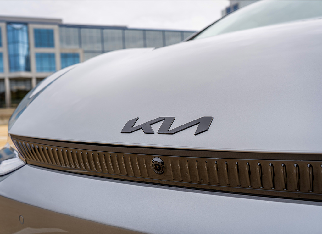 Blackout front Kia Emblem on a Kia EV6