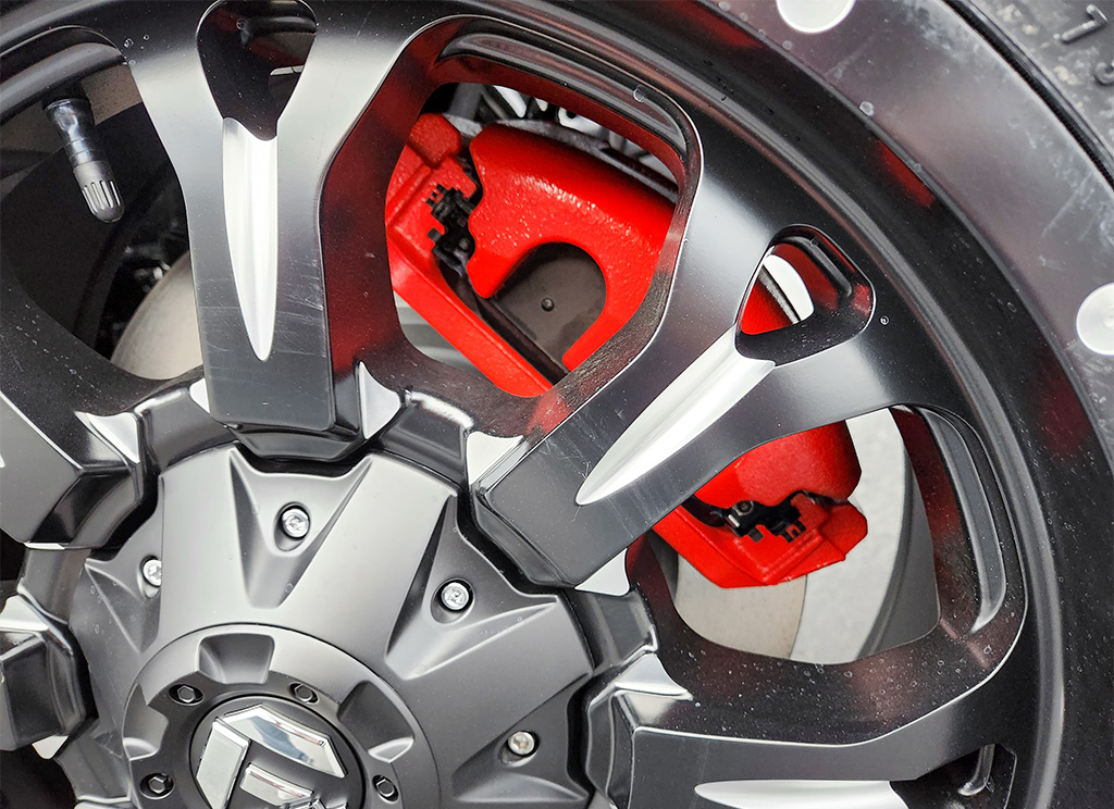 Red painted calipers on a custom Ram 1500