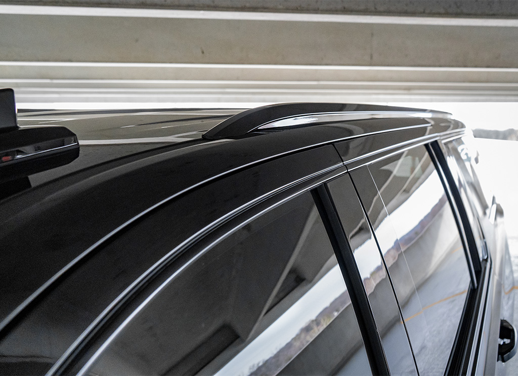 Custom painted black roof rails.