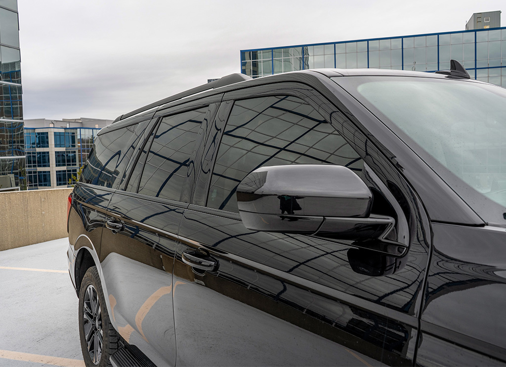 Ford Expedition with chrome delete window trim.