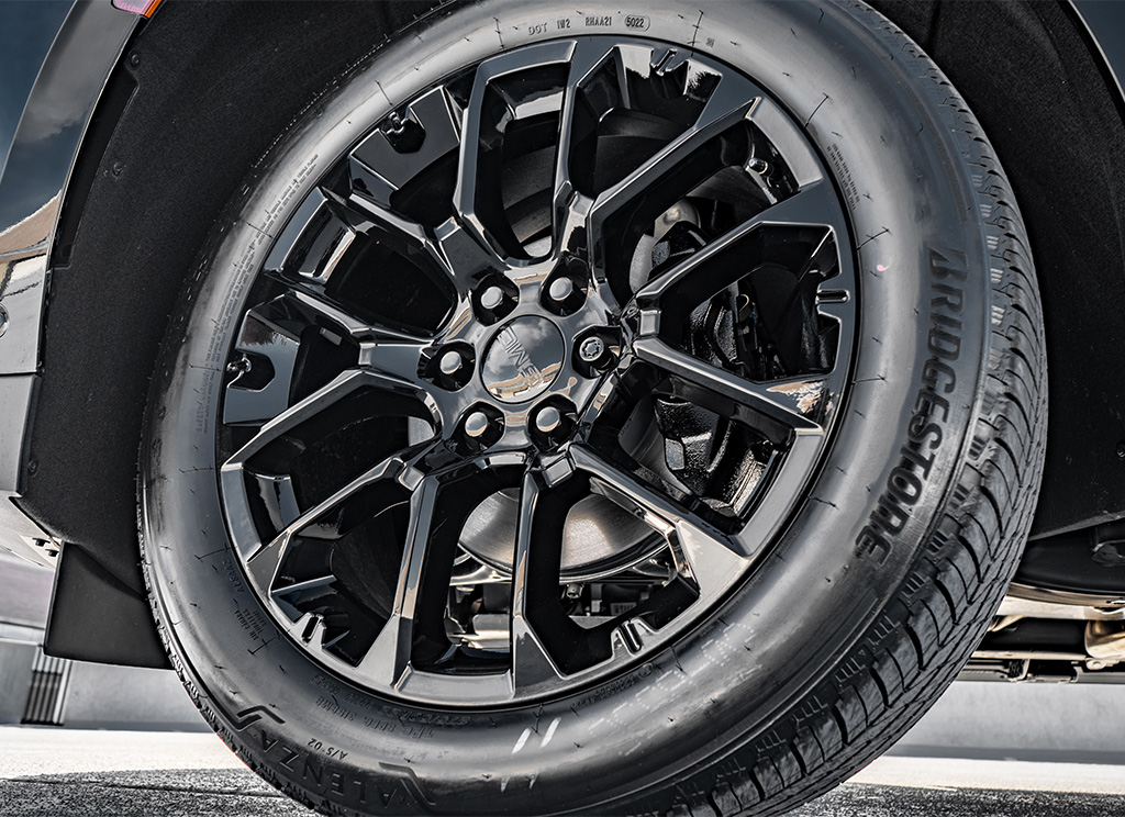 Black powder coated GMC Yukon factory wheels