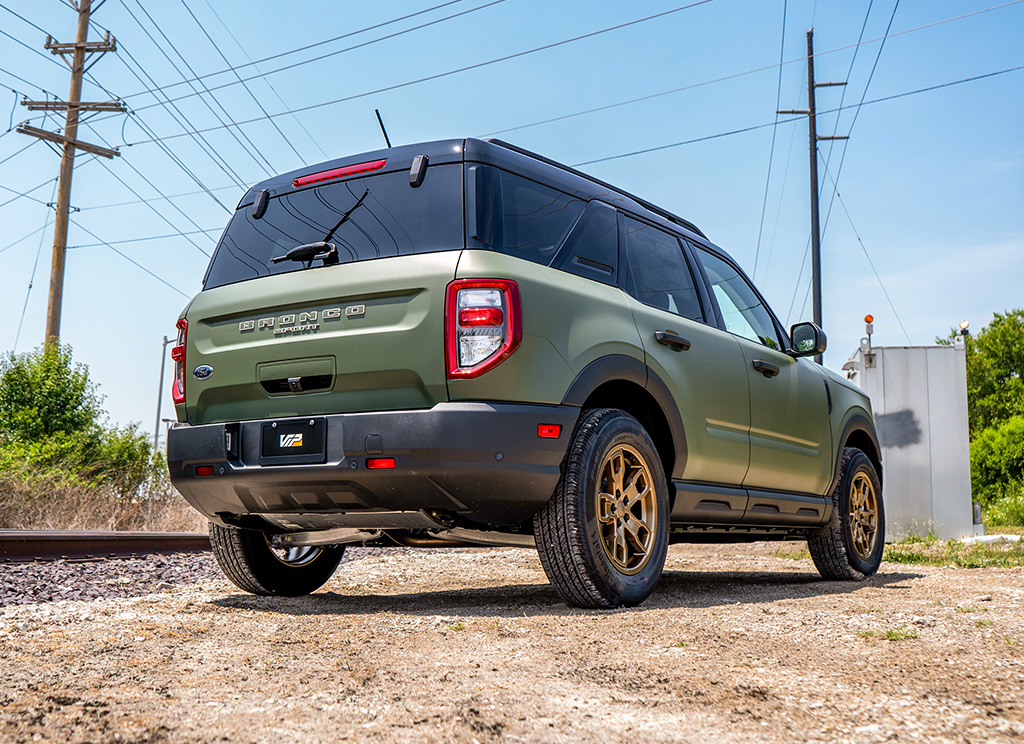 Rear view of a vinyl wrapped green Bronco Sport SUV