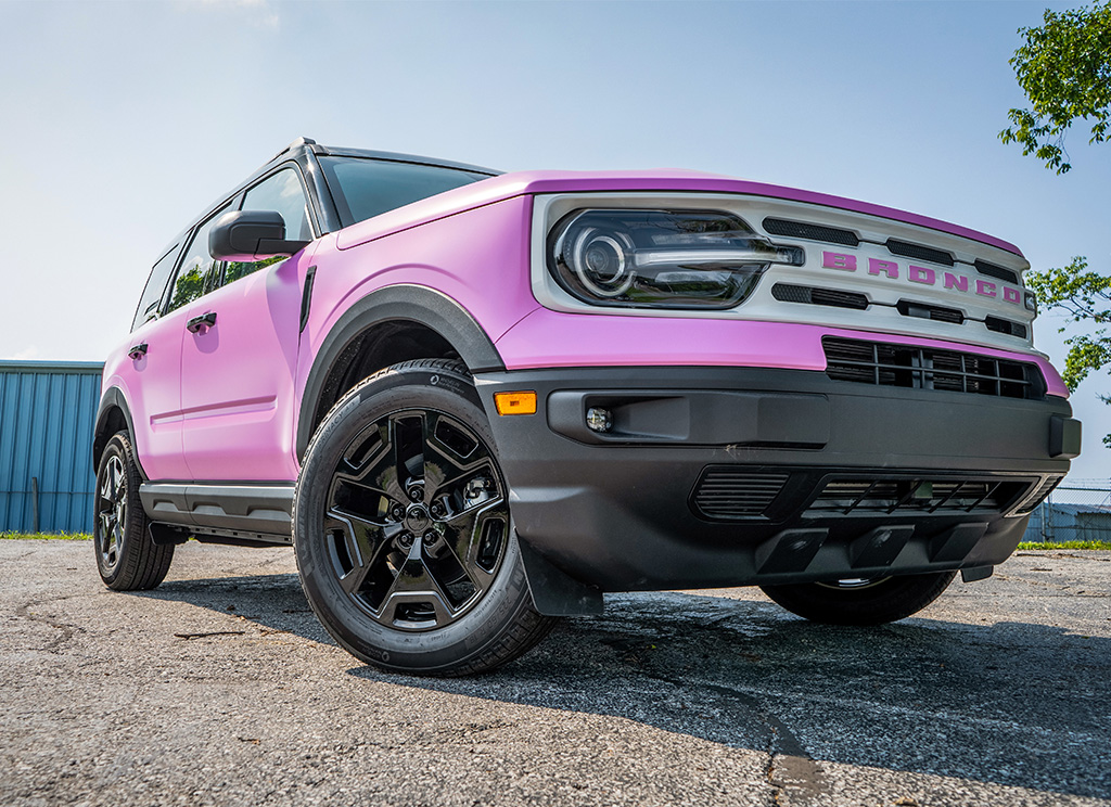 Black powder coated wheels on a pink Bronco Sport