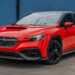 Custom red 2023 WRX with a chrome delete and two-tone wrap.