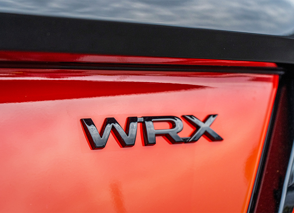 Blackout Subaru WRX lettering badge.