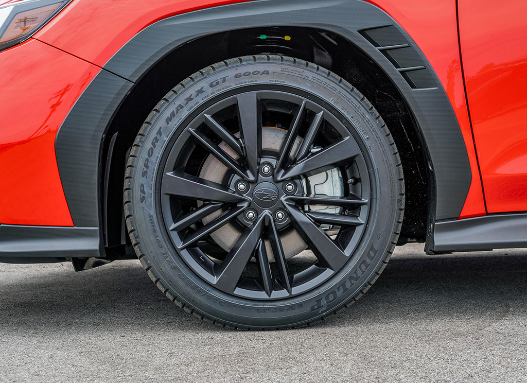 Satin black powder coated wheels on a Subaru WRX