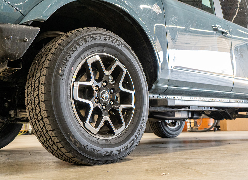 Stock Ford Bronco wheels and tires.