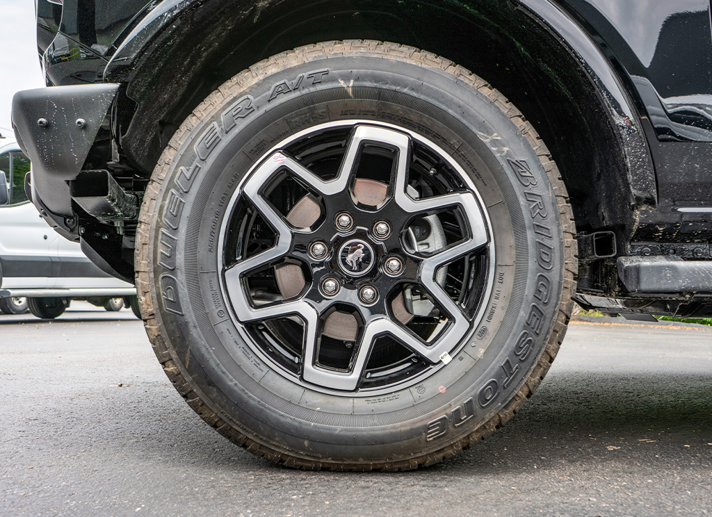 Stock 2023 Bronco Outer Banks wheels with Bridgestone tires. 