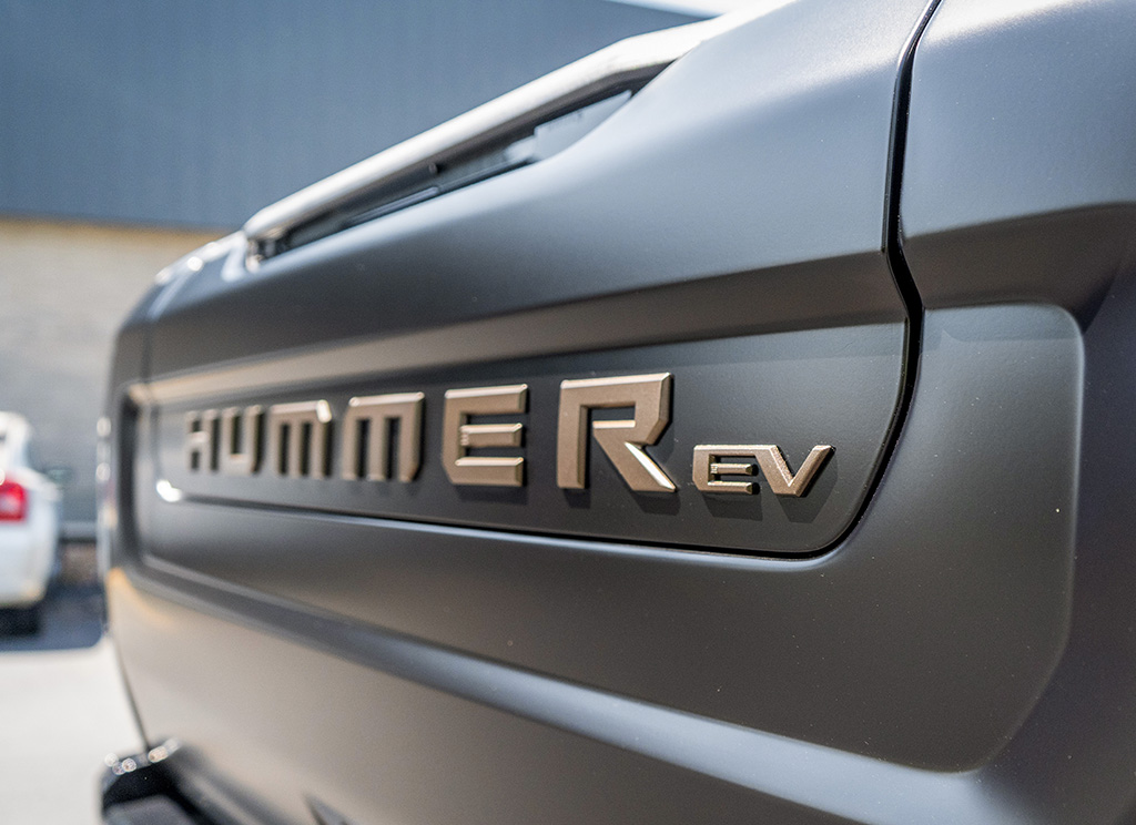 Custom Hummer EV tailgate nameplate painted bronze aftermarket.