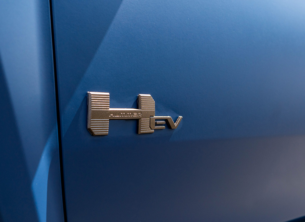 Custom Hummer EV emblem painted bronze for a chrome delete.