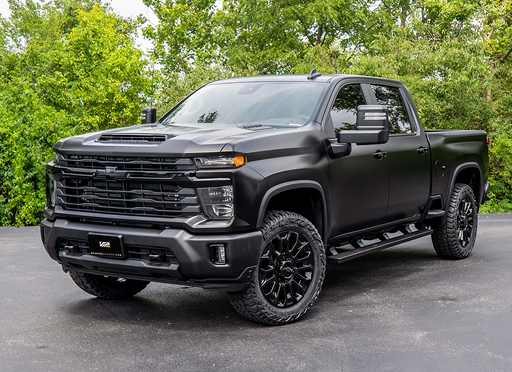 Satin black Chevy Silverado HD 2500 vinyl wrap.