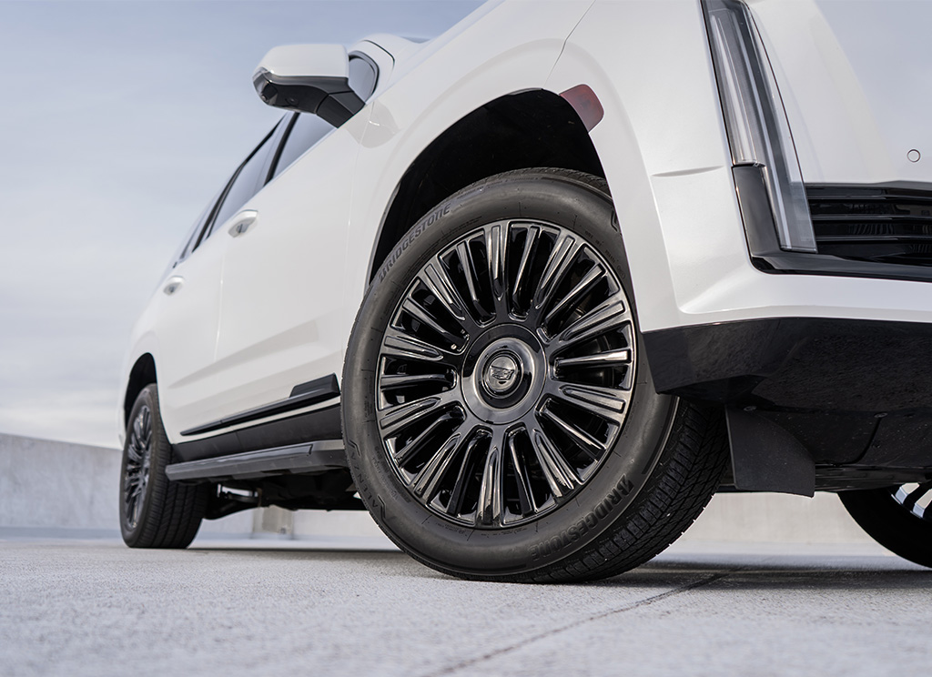 Cadillac Escalade wheels with a gloss black powder coat finish.
