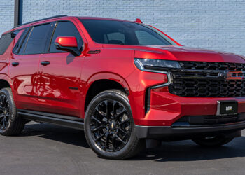 Radiant Red 2023 Chevy Tahoe with black chrome delete trim.