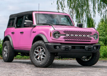 Custom Pink Ford Bronco 2023 SUV with accessories.