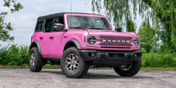 Custom Pink Ford Bronco 2023 SUV with accessories.