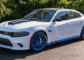 White 2022 Dodge Charger Scat Pack with Blue and Black Daytona Graphics.