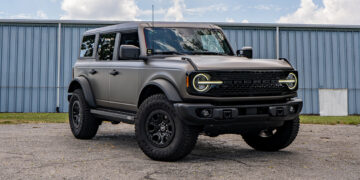 Custom 2023 Ford Bronco with a satin charcoal grey vinyl wrap and black accents.