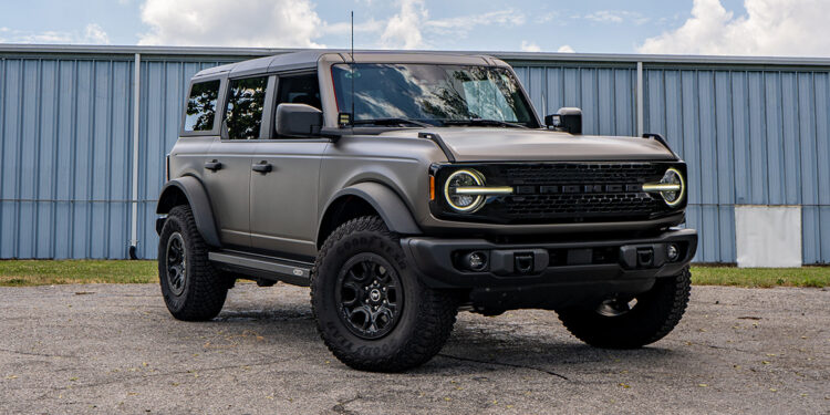 Custom 2023 Ford Bronco with a satin charcoal grey vinyl wrap and black accents.