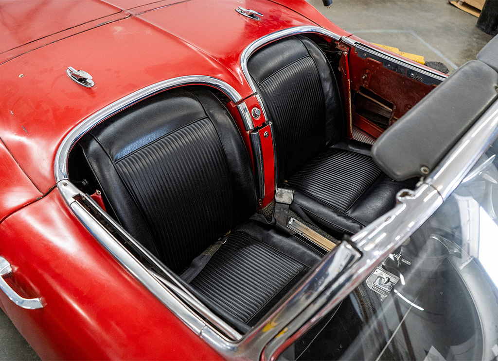 Black tuck and roll vintage leather seats in a C1 Corvette.