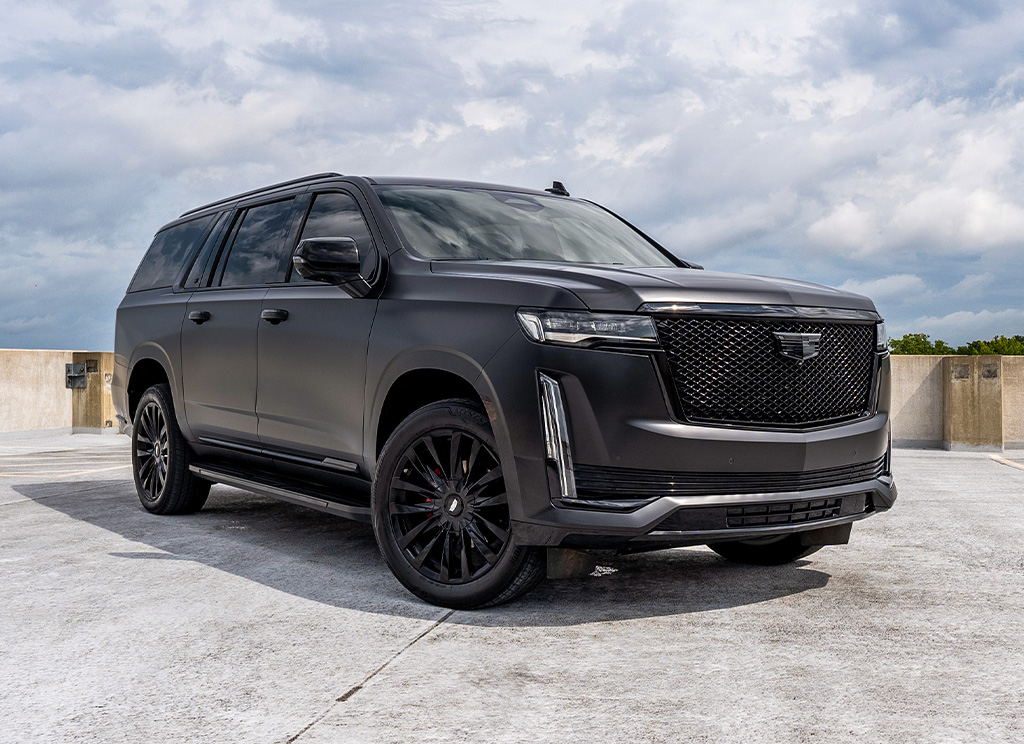 satin black wrapped cadillac escalade