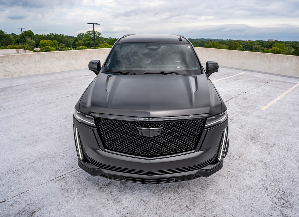 satin black wrapped cadillac escalade