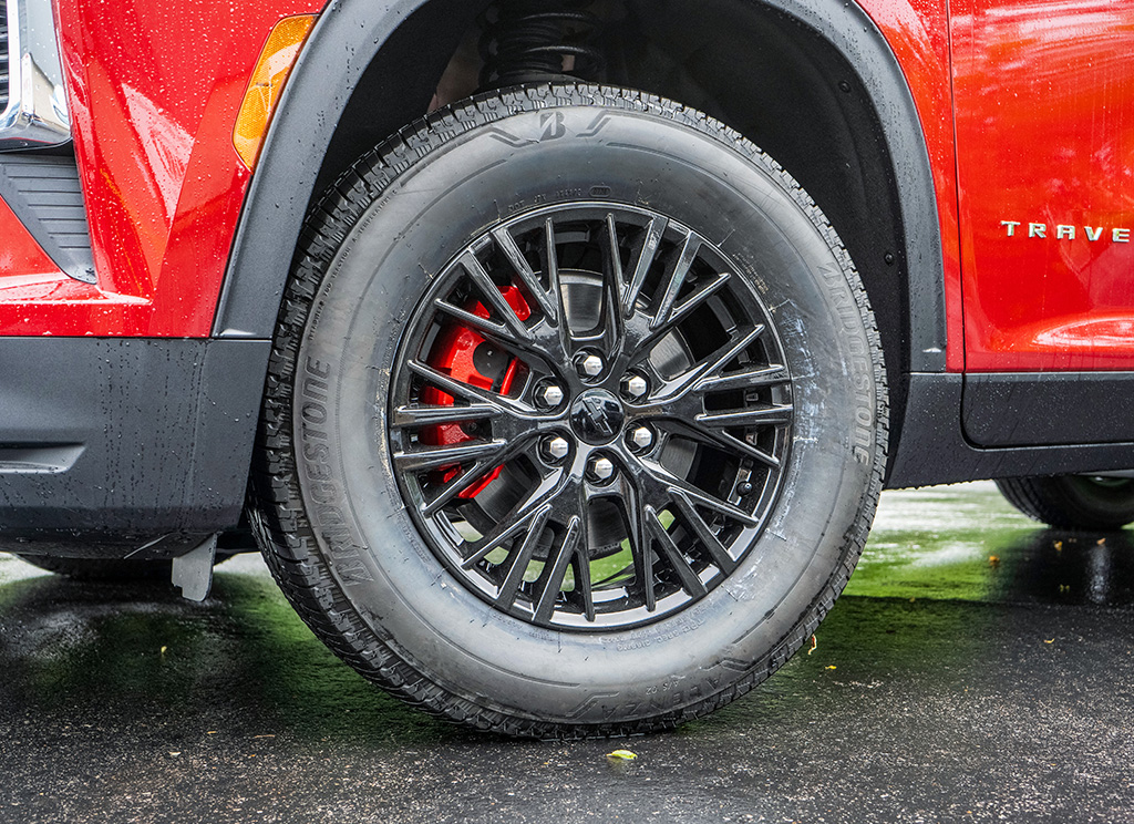 Gloss black powder coated Chevy Traverse wheels with red painted brake calipers.