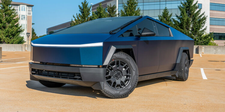 Custom Tesla Cybertruck wrapped in a satin blue color flip vinyl by Avery Dennison called Frozen Ocean.