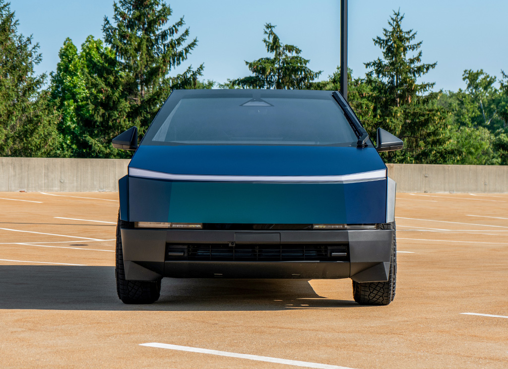 Front end of a blue color flip Tesla Cybertruck.