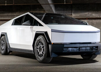 White Tesla Cybertruck with a custom vinyl wrap.