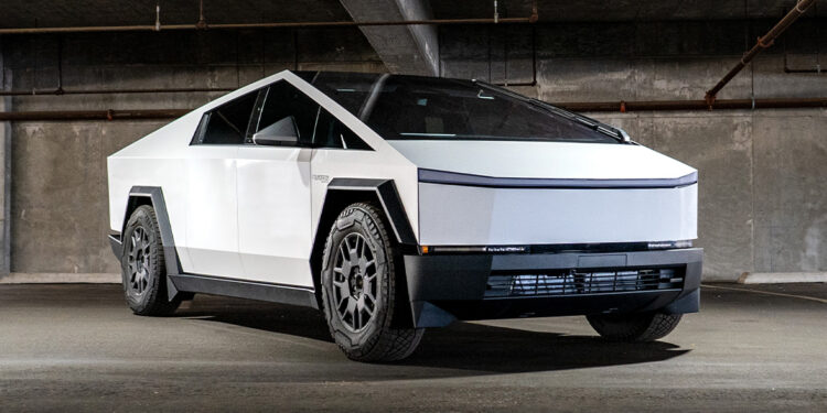 White Tesla Cybertruck with a custom vinyl wrap.