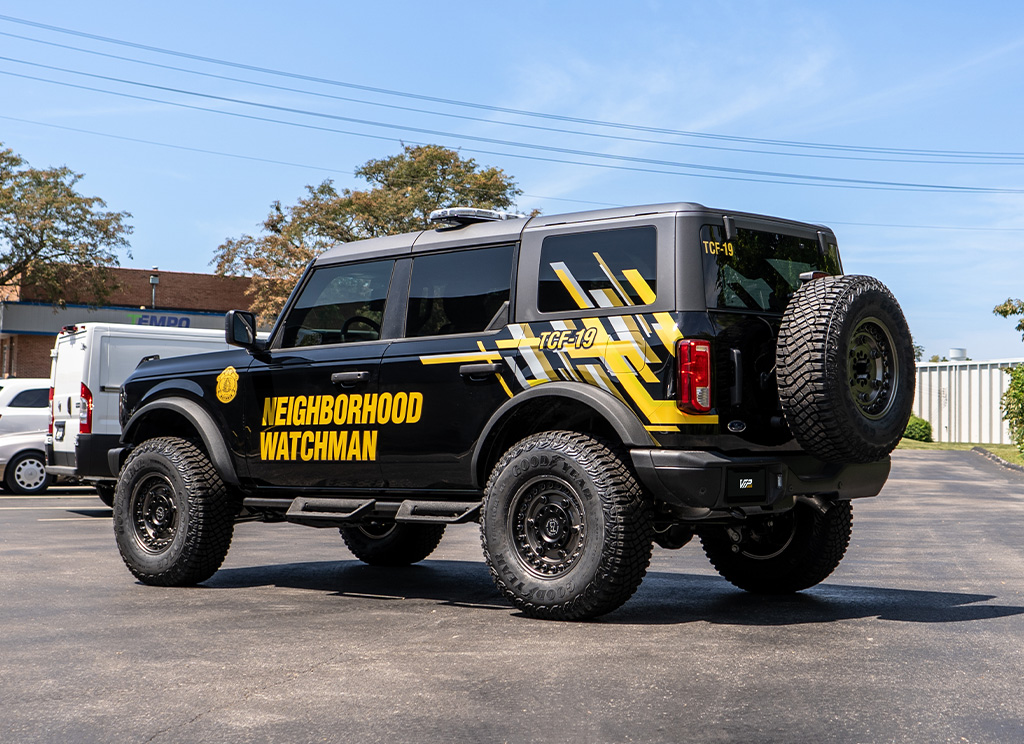 Rear view show of a Ford Bronco outfitted with security accessories.