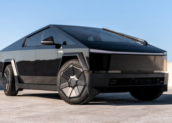 Gloss black Cybertruck wrap with metallic vinyl.