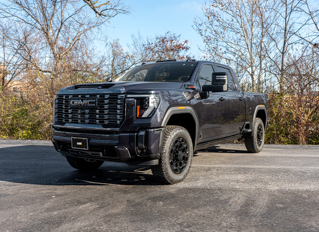 Chrome delete trim and Vader chrome grille on a custom blackout GMC Sierra HD 3500.