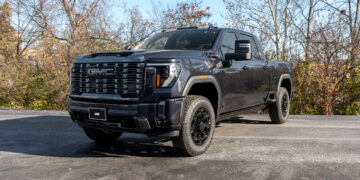 GMC Sierra 2500 HD Denali with chrome delete trim and a vader chrome grille.