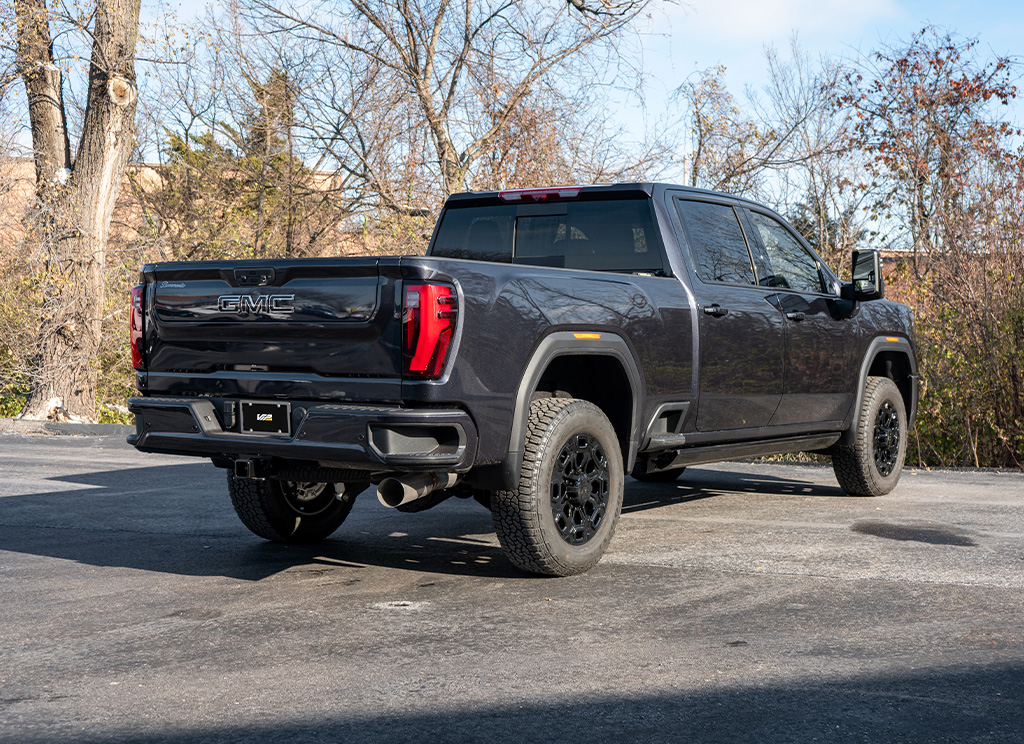 Rear angle view of a GMC Sierra HD 3500 with custom chrome delete trim.