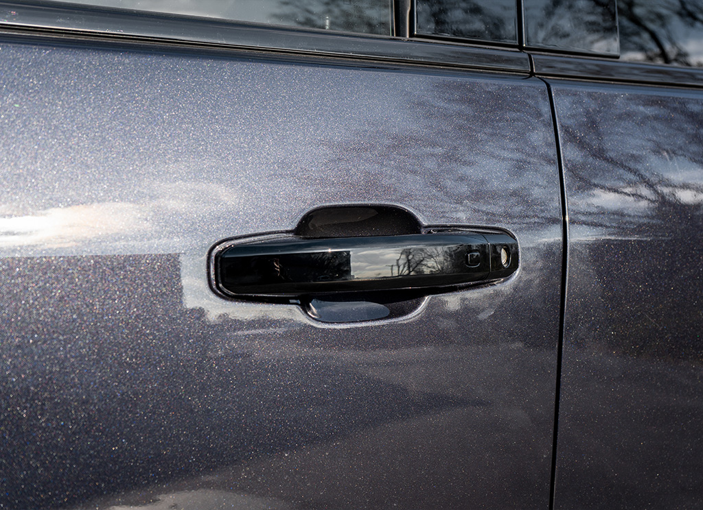 Blackout replacement handles on a 2024 GMC Sierra HD 3500 truck.