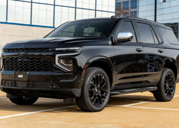 Blackout 2025 Chevy Tahoe with chrome delete trim.