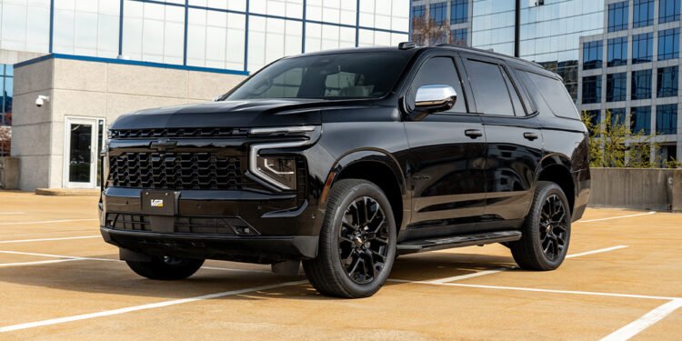 Blackout 2025 Chevy Tahoe with chrome delete trim.