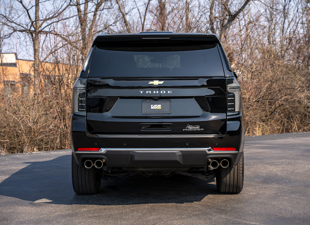 Stock chrome rear bumper and tailgate emblems on a 2025 Chevy Tahoe.