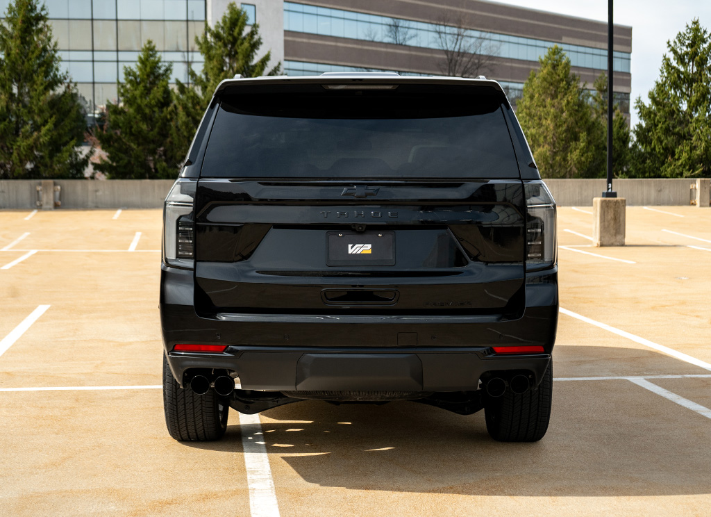 Blackout rear bumper and tailgate emblems on a 2025 Chevy Tahoe.