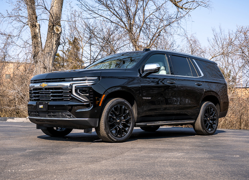 Front view of a stock 2025 Chevy Tahoe with chrome trim and accents.