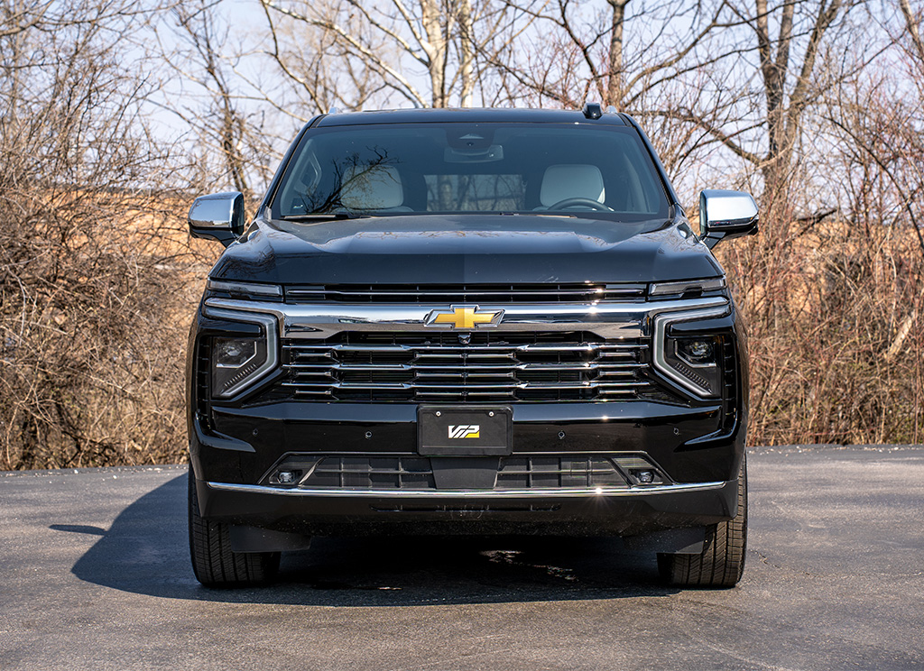 Stock 2025 Chevy Tahoe with chrome grille and front bumper.
