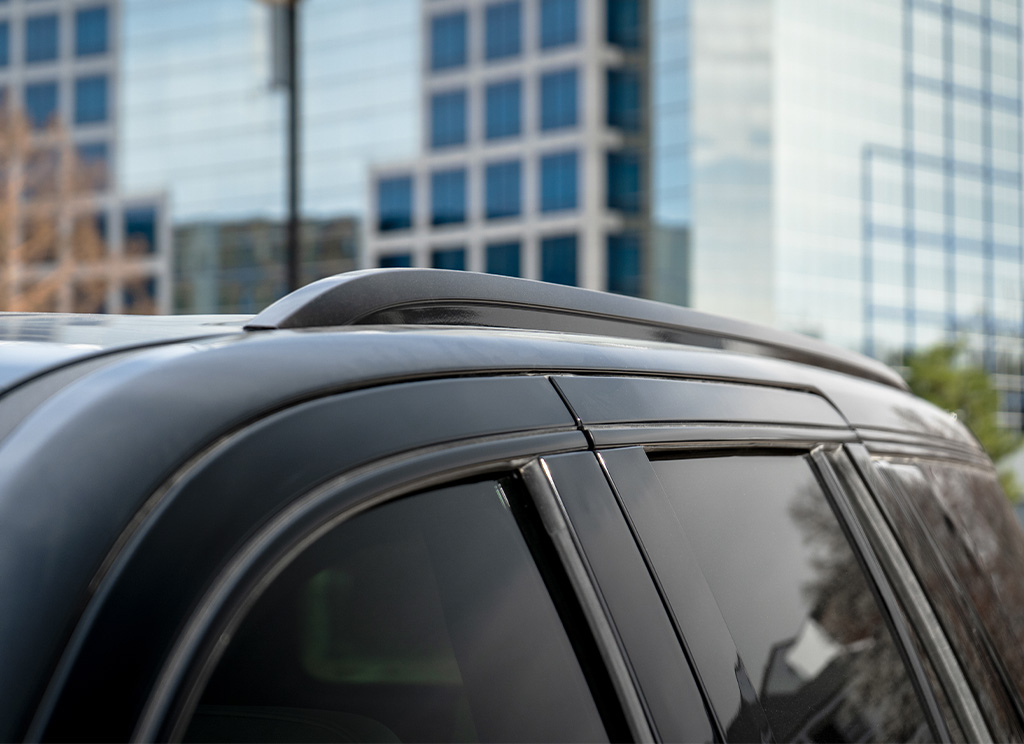 Custom black roof rails installed on a 2025 Chevy Tahoe.
