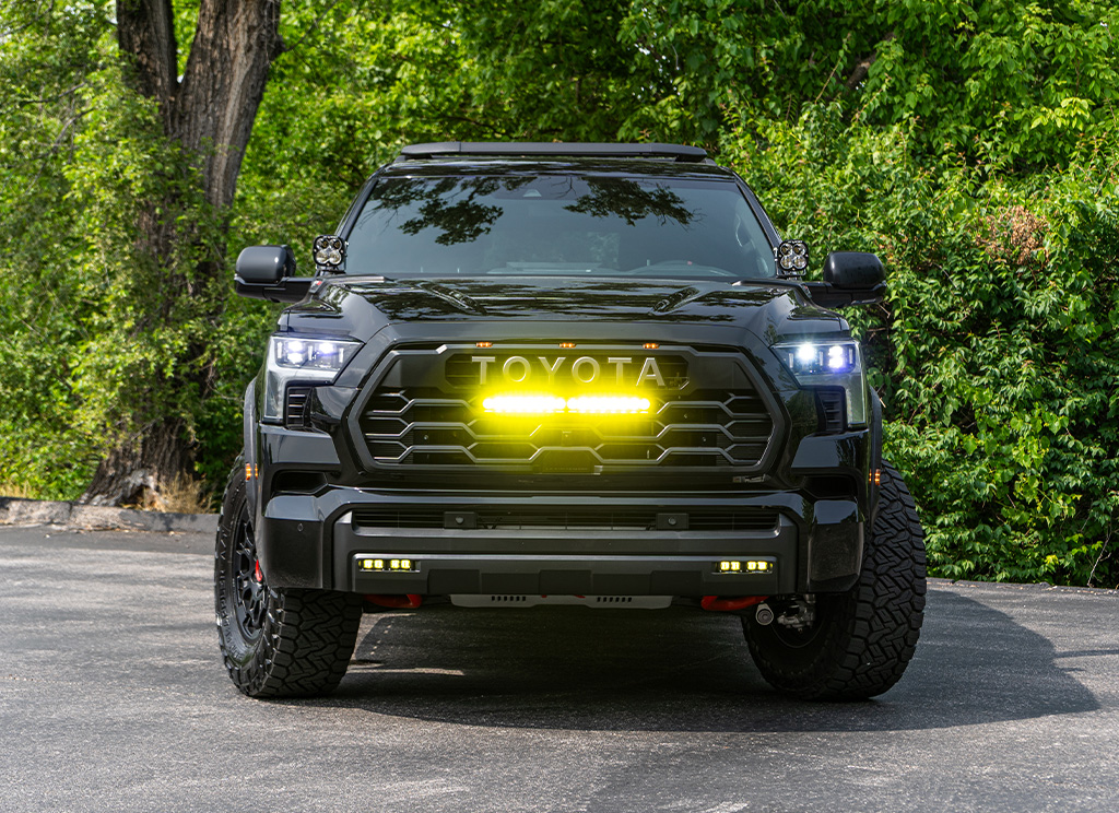 TRD Pro grille with aftermarket off road LED lighting on a lifted 2025 Toyota Sequoia.