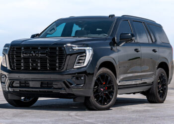 Custom chrome delete 2025 GMC Yukon Denali with blackout trim.