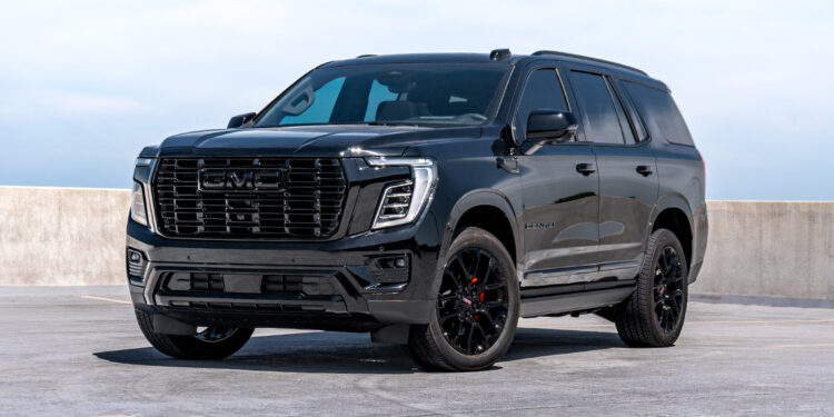 Custom chrome delete 2025 GMC Yukon Denali with blackout trim.