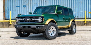 Green 2025 Ford Bronco styled like the retro Eddie Bauer Edition.