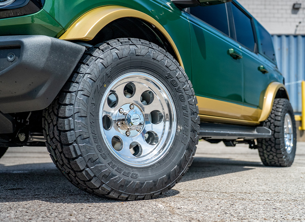 Pro Comp Xtreme Alloys Series 1069 polished chrome wheels on a 2025 custom Ford Bronco build.